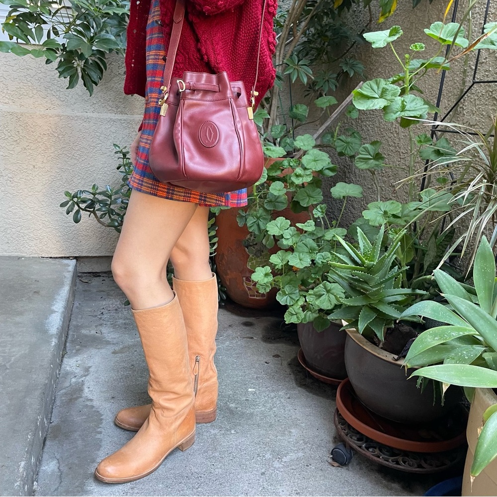 Orange/cream Prada pebbled all leather pull up riding boots